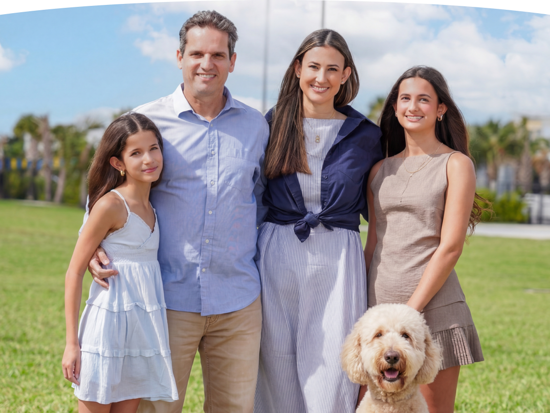 Family enjoying a day at the park with their dog, featuring a text overlay.
